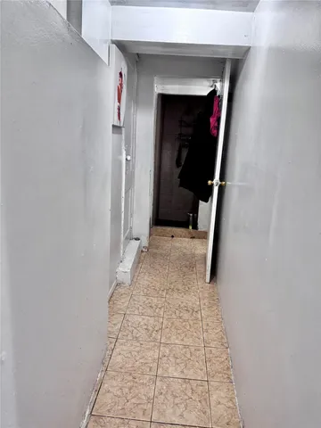 a view of hallway with stairs