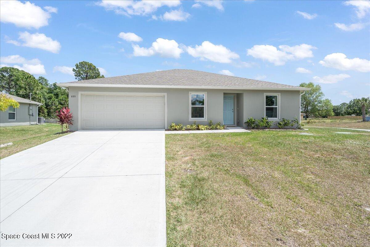 895 Fletcher Road Southeast Palm Bay, FL 32909 - Photo 4 of 25 02-untitled-1