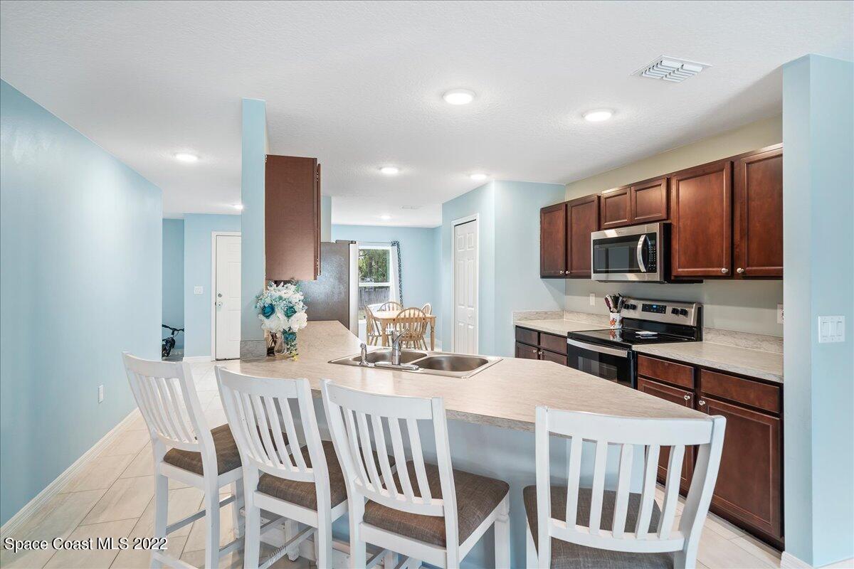895 Fletcher Road Southeast Palm Bay, FL 32909 - Photo 10 of 25 06-untitled-22