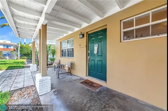 a view of an outdoor space with porch and patio