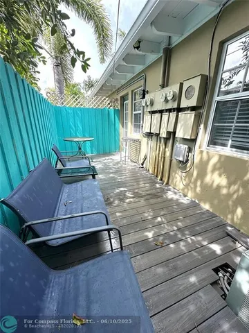 a view of a backyard with a patio