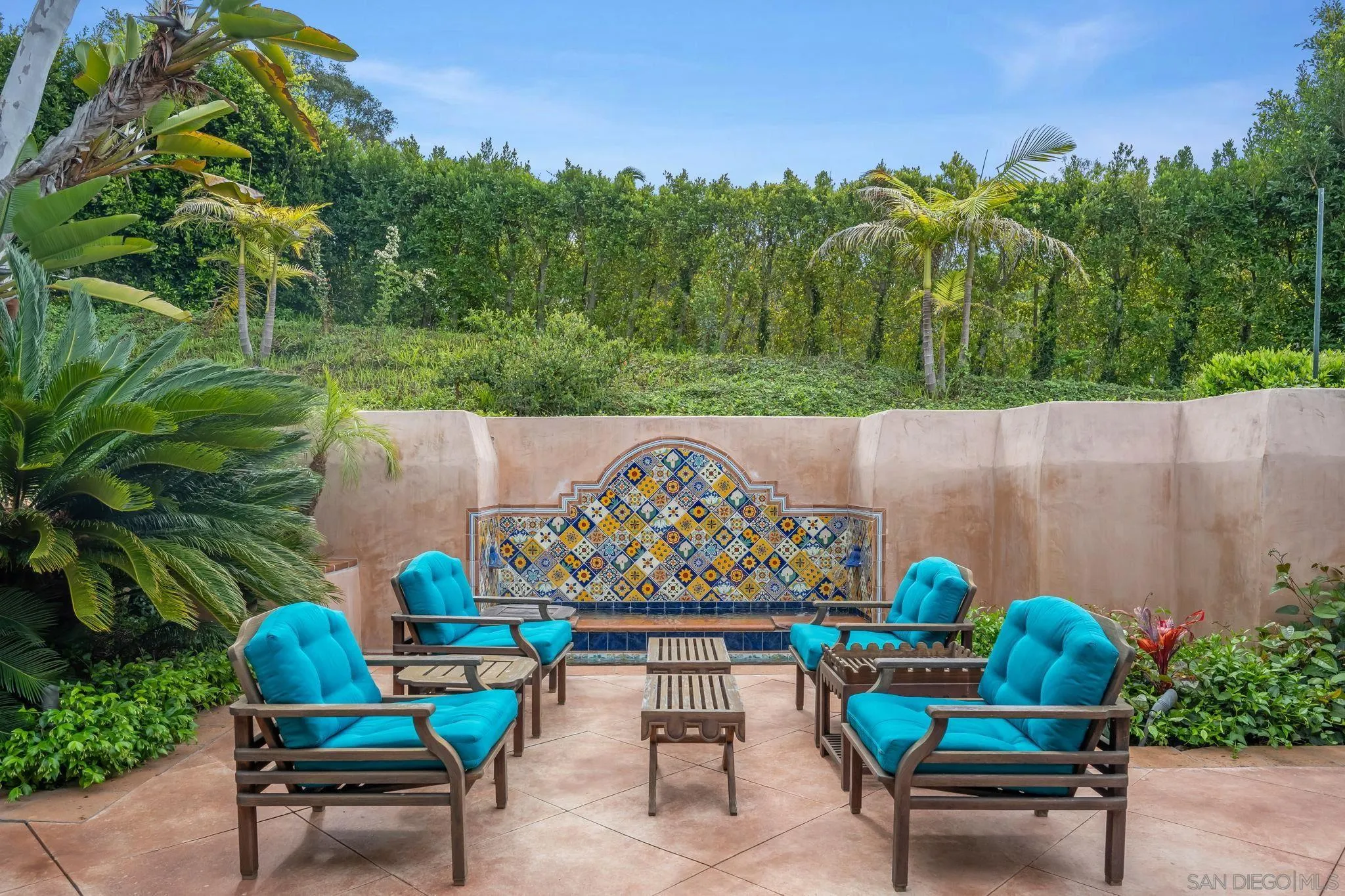 6002 Paseo Valencia Rancho Santa Fe, CA 92067 - Photo 12 of 33 an outdoor sitting area with a couch