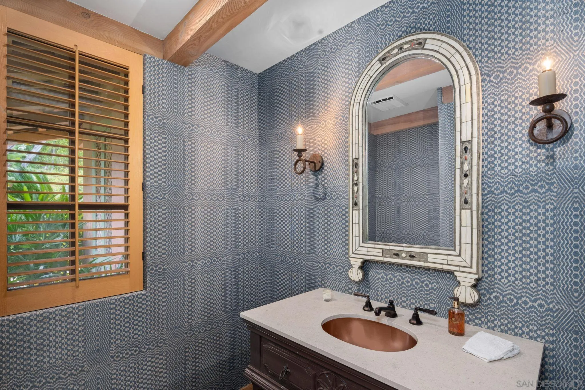 6002 Paseo Valencia Rancho Santa Fe, CA 92067 - Photo 14 of 33 a bathroom with a sink and a mirror