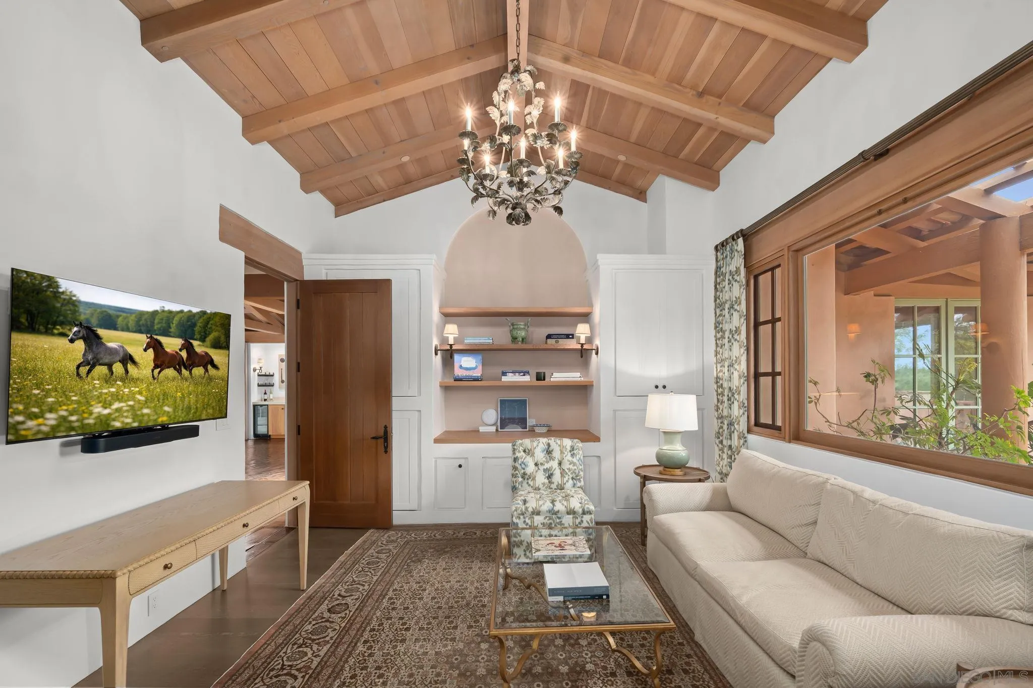 6002 Paseo Valencia Rancho Santa Fe, CA 92067 - Photo 15 of 33 a living room with furniture and a flat screen tv