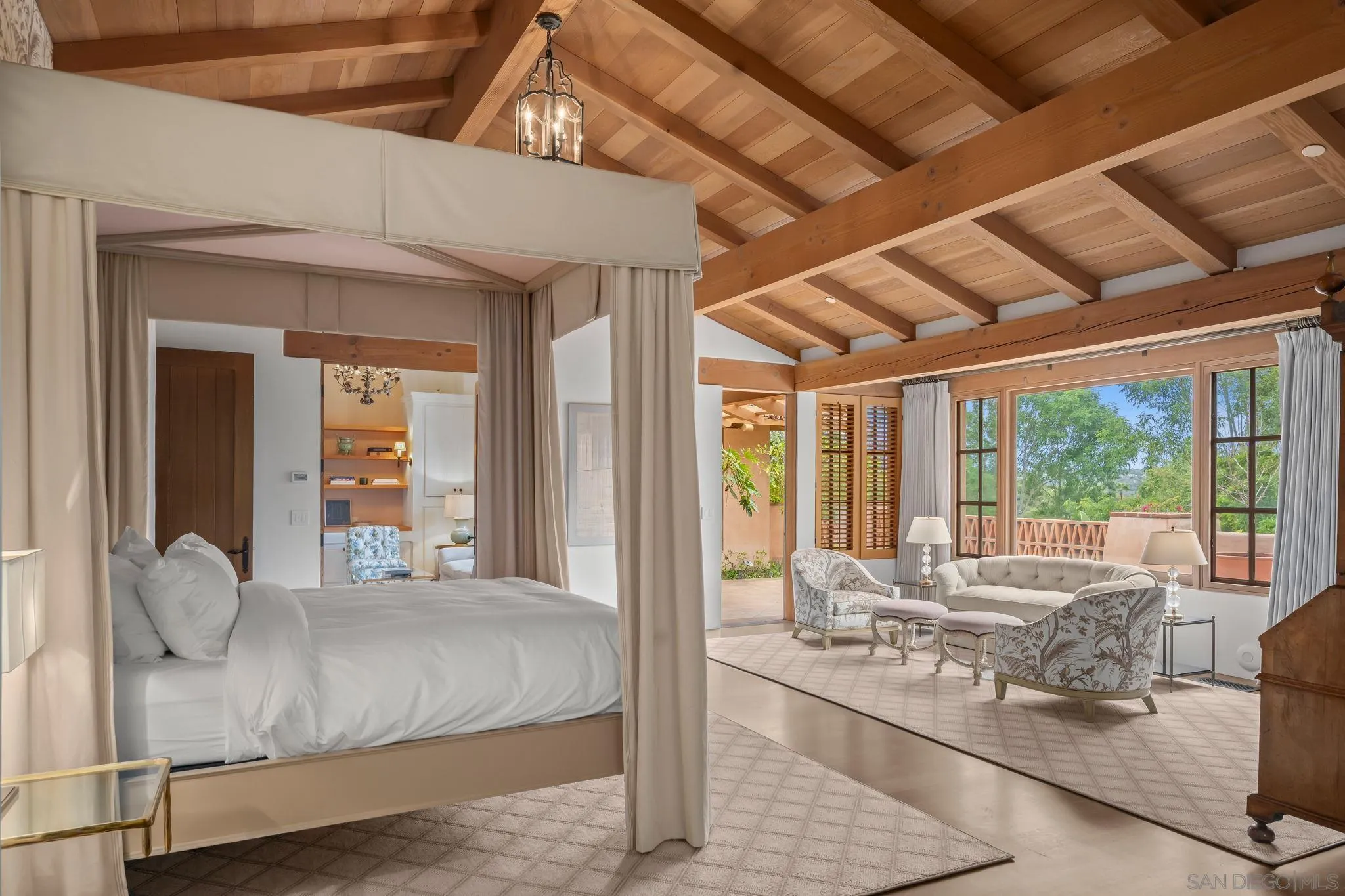 6002 Paseo Valencia Rancho Santa Fe, CA 92067 - Photo 16 of 33 a bedroom with furniture and large windows