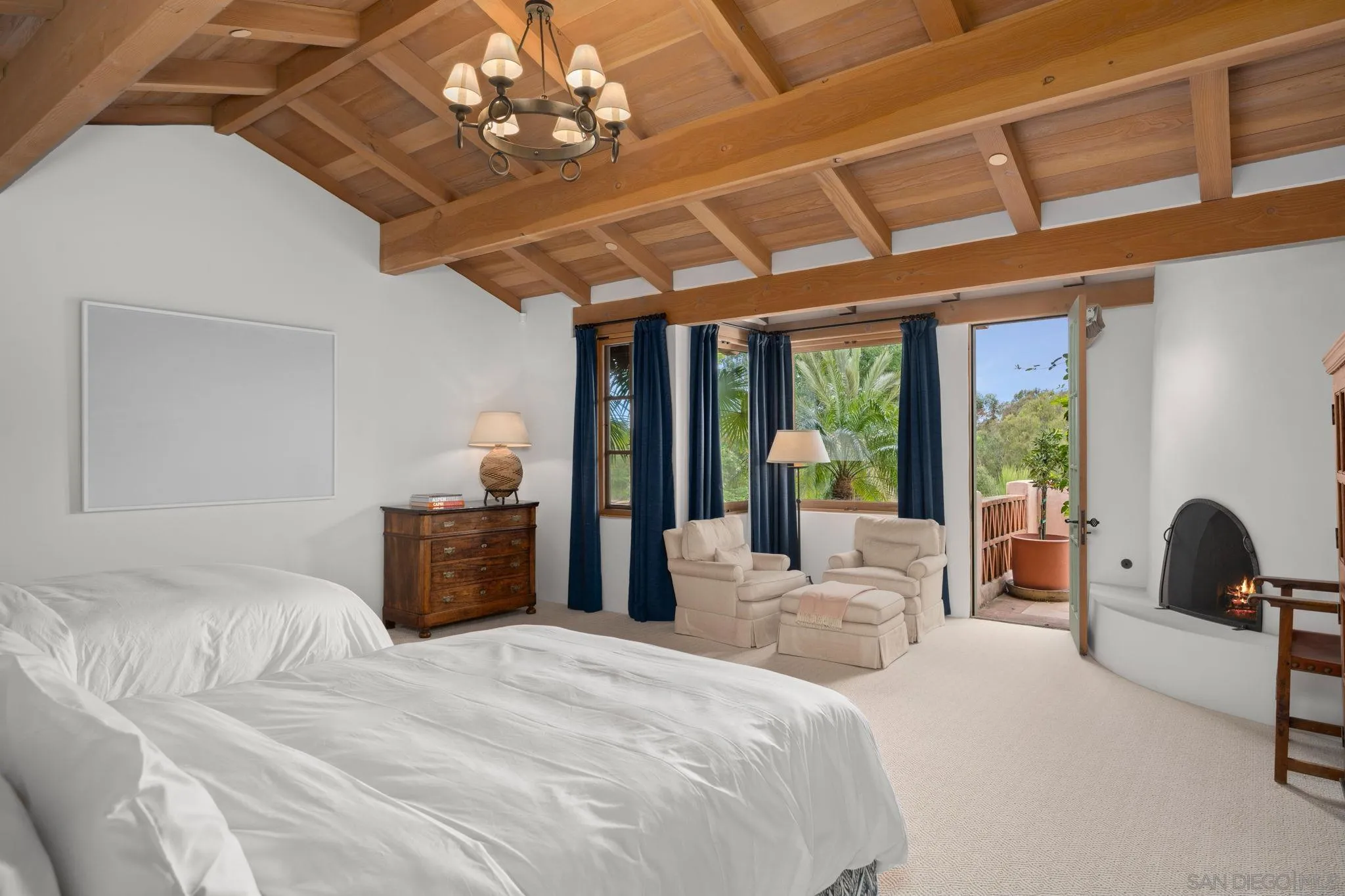 6002 Paseo Valencia Rancho Santa Fe, CA 92067 - Photo 27 of 33 a bedroom with a bed and a large window