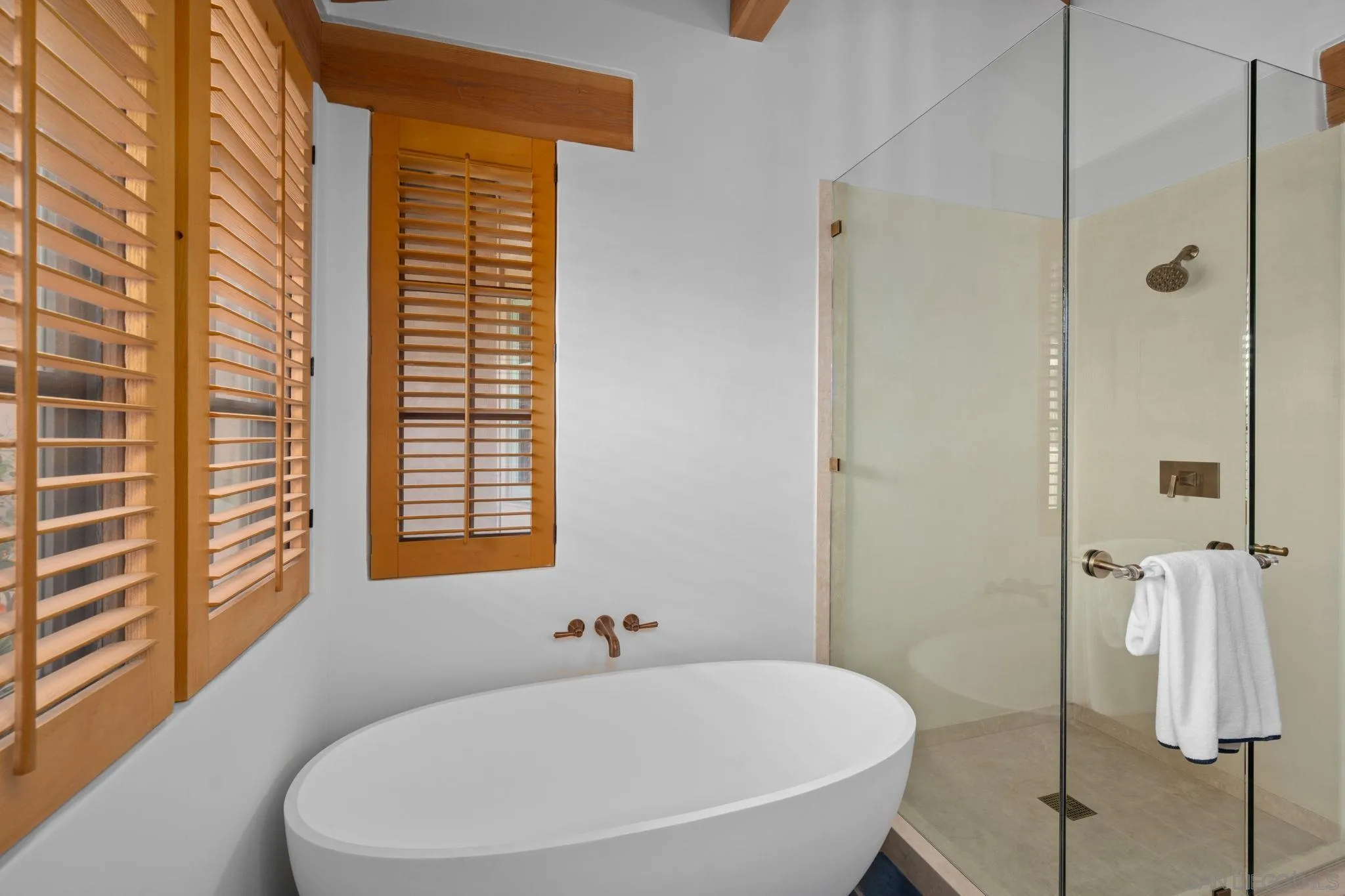 6002 Paseo Valencia Rancho Santa Fe, CA 92067 - Photo 30 of 33 a bathroom with a bathtub and a shower