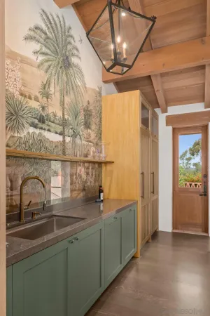 a bathroom with a sink and mirror