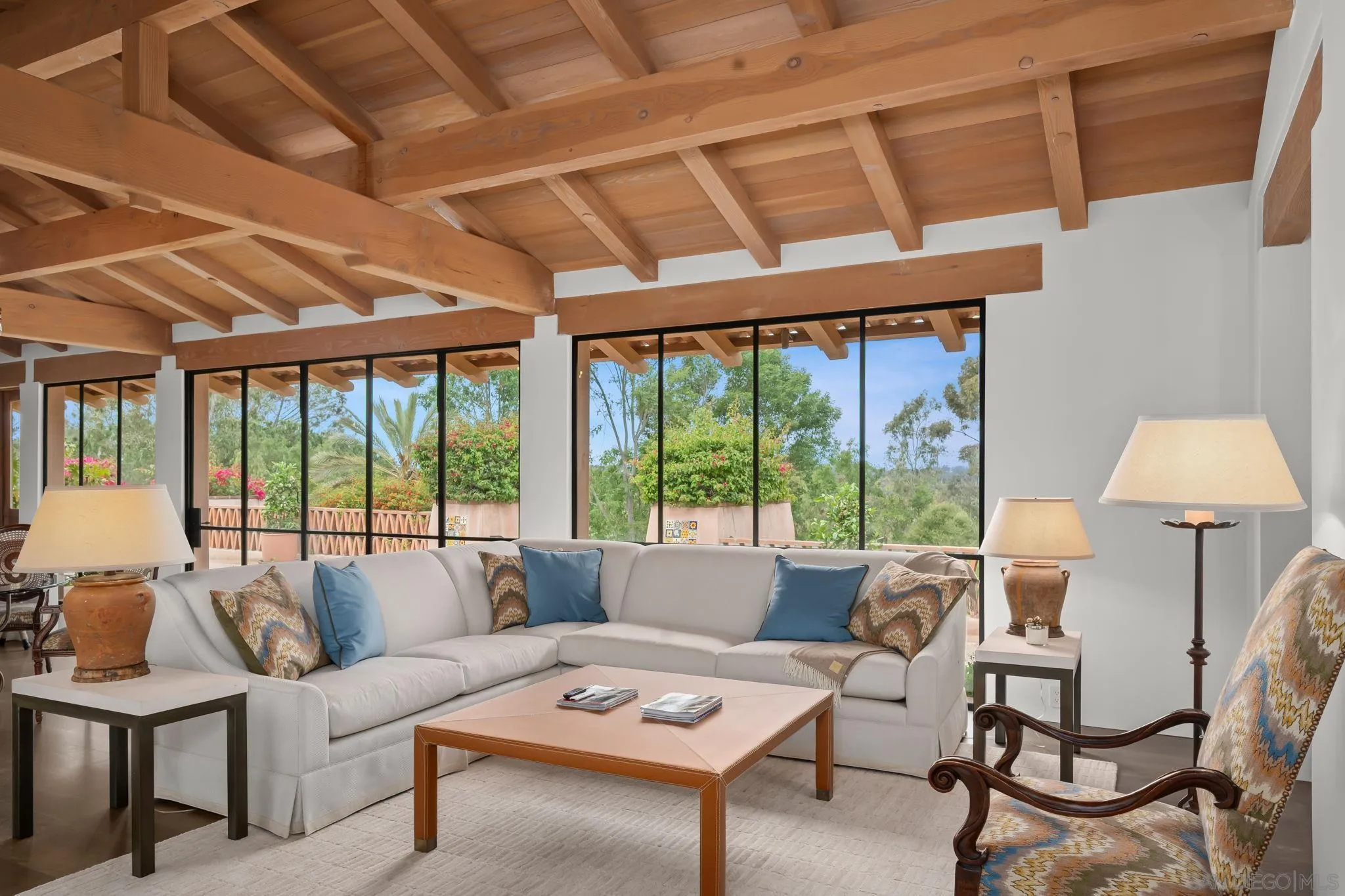 6002 Paseo Valencia Rancho Santa Fe, CA 92067 - Photo 8 of 33 a living room with furniture and a large window