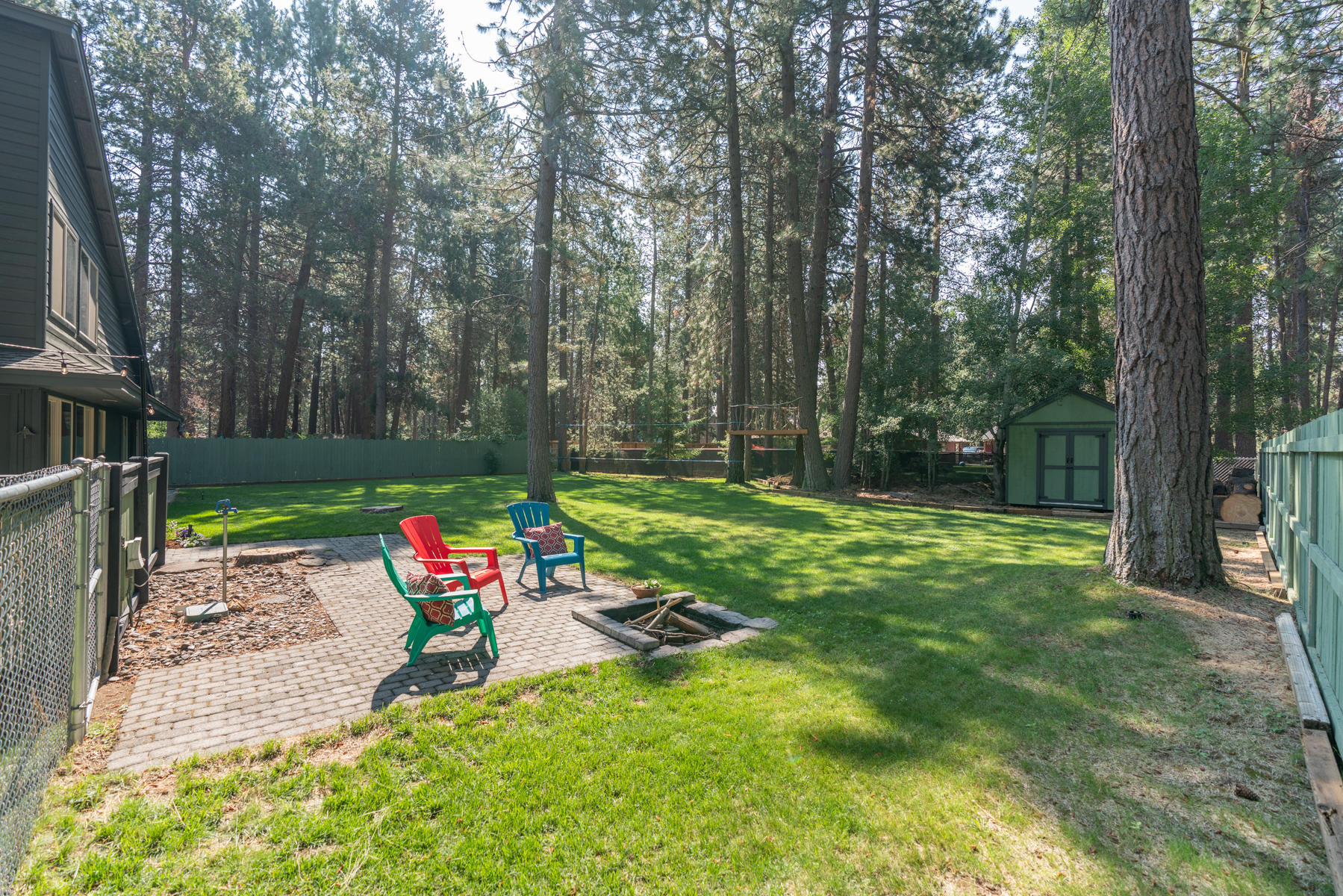 17039 Spring River Road Bend, OR 97707 - Photo 23 of 28 Park-like back yard w/paver patio and firepit!