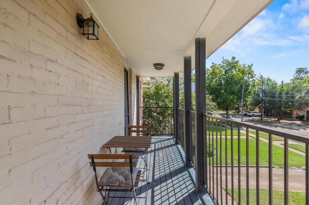 5927 Lewis Street Dallas, TX 75206 - Photo 14 of 19 a view of a balcony with chairs