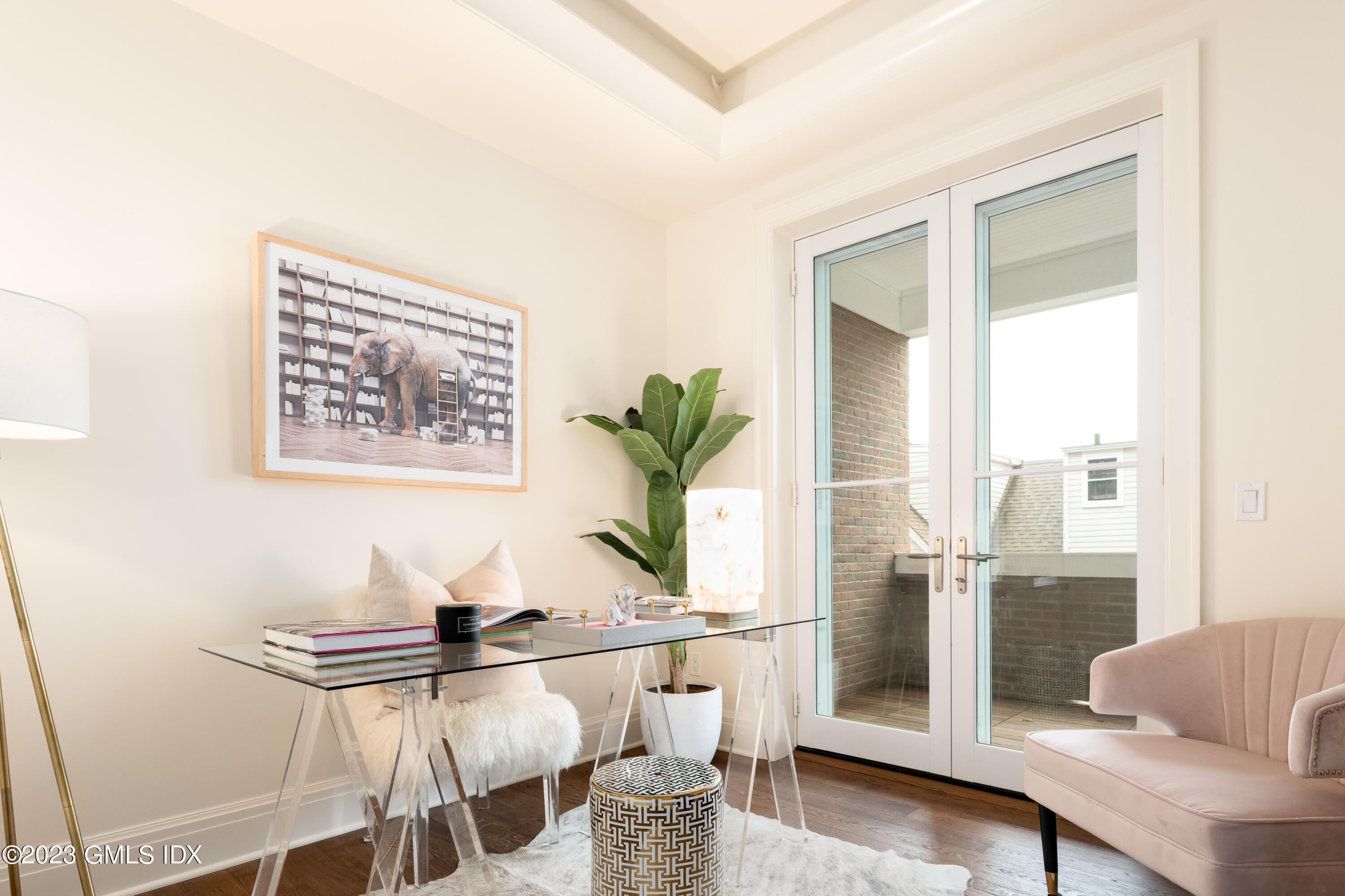 62 Mason Street, Unit 2W Greenwich, CT 06830 - Photo 9 of 15 a living room with furniture and a table