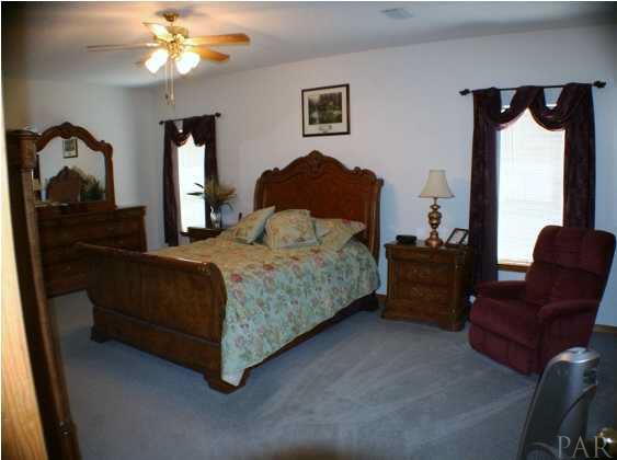 6012 Saddle Club Road Pace, FL 32571 - Photo 12 of 24 Large master suite ~ Located downstairs.