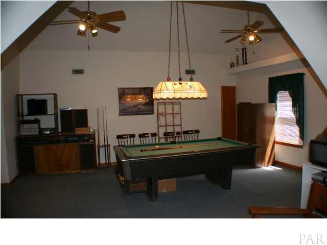 6012 Saddle Club Road Pace, FL 32571 - Photo 17 of 24 This is the BONUS ROOM ~ And what a bonus! Double ceiling fans, has its own thermostat and could be converted to one massive bedroom very easily. BONUS!!! The POOL TABLE STAYS!