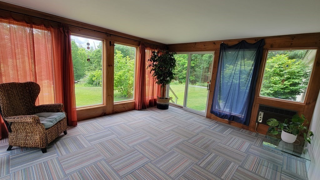 9 David Drive Pelham, NH 03076 - Photo 11 of 42 a view of livingroom with furniture and staircase