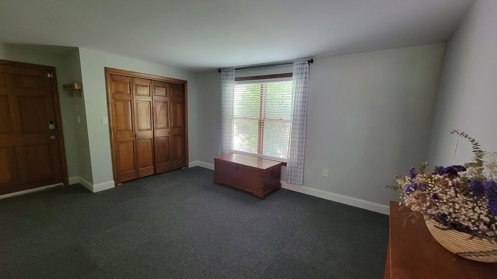 9 David Drive Pelham, NH 03076 - Photo 14 of 42 an empty room with windows
