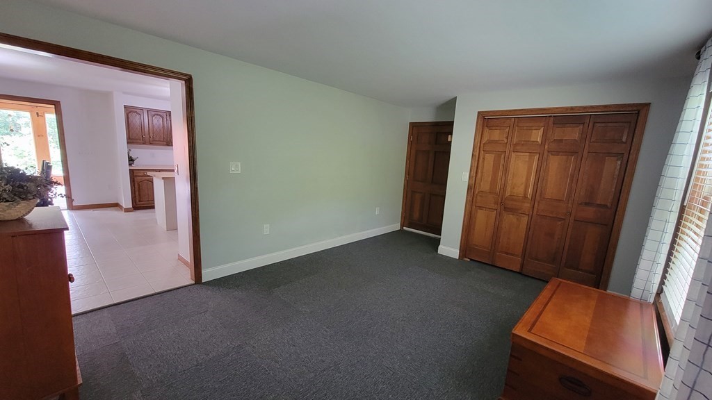 9 David Drive Pelham, NH 03076 - Photo 15 of 42 an empty room with windows