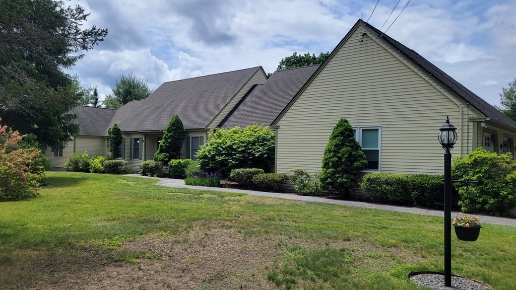 9 David Drive Pelham, NH 03076 - Photo 2 of 42 a view of a house with backyard and garden