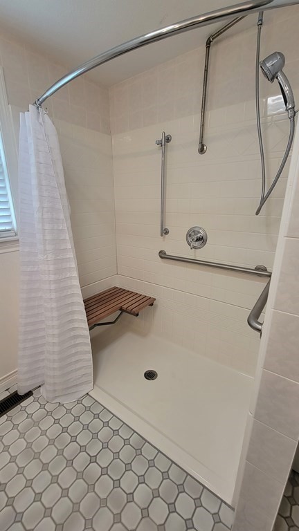 9 David Drive Pelham, NH 03076 - Photo 34 of 42 a bathroom with a sink and a shower