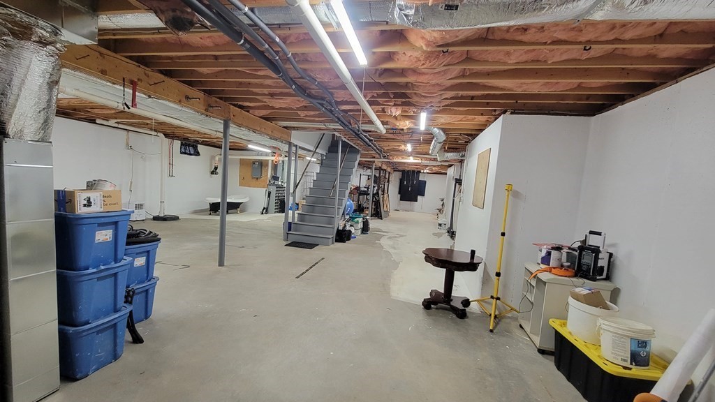 9 David Drive Pelham, NH 03076 - Photo 38 of 42 a view of a room with gym equipment