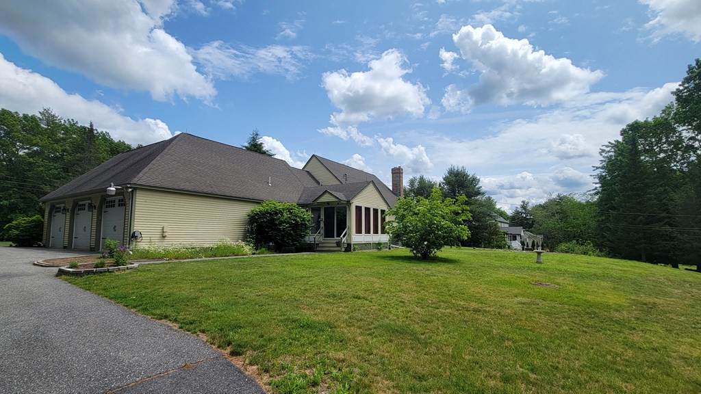 9 David Drive Pelham, NH 03076 - Photo 41 of 42 a view of a house with a big yard and a large tree