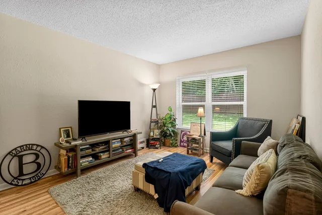 a workspace with furniture and book shelf