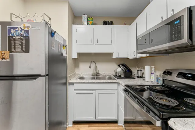 a view of a workspace with furniture and toys