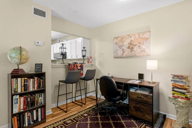 a bedroom with bed and a window