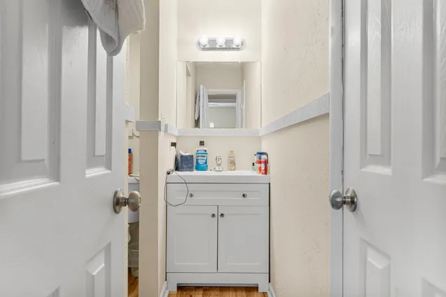 a bathroom with a sink and a mirror