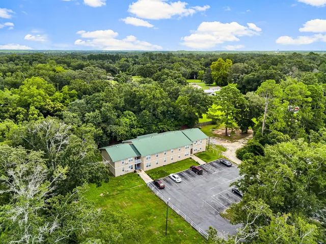 a view of a yard with an outdoor space and seating
