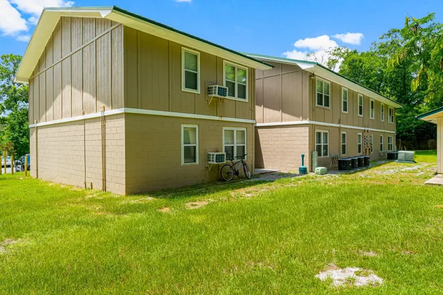 a view of a back yard of the house