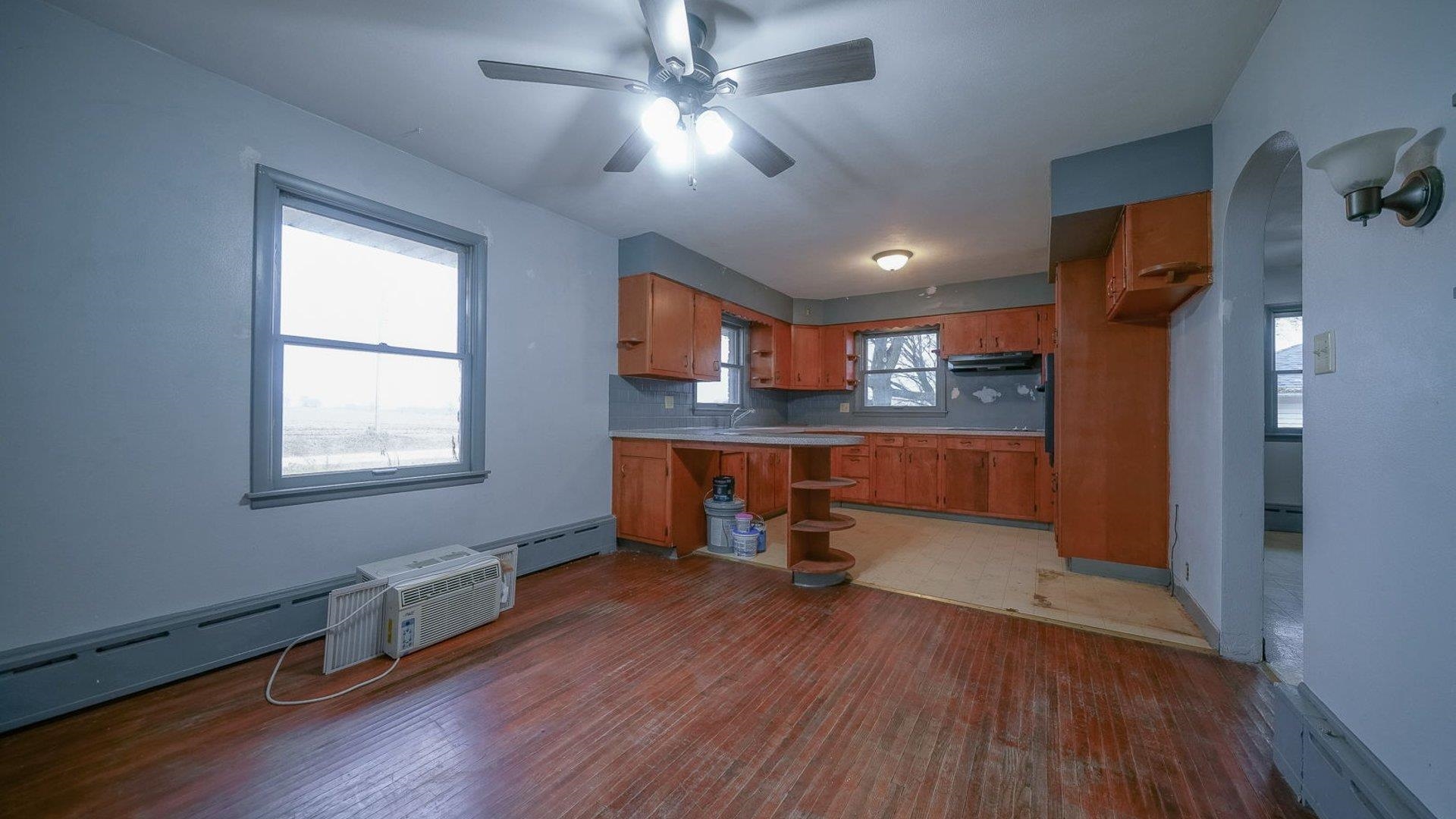 2610 Klinger Road Pecatonica, IL 61063 - Photo 32 of 53 a view of a workspace with furniture and a kitchen