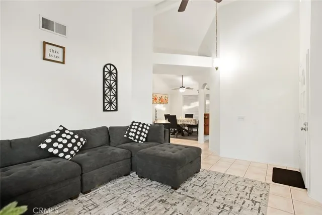 a living room with furniture and a couch