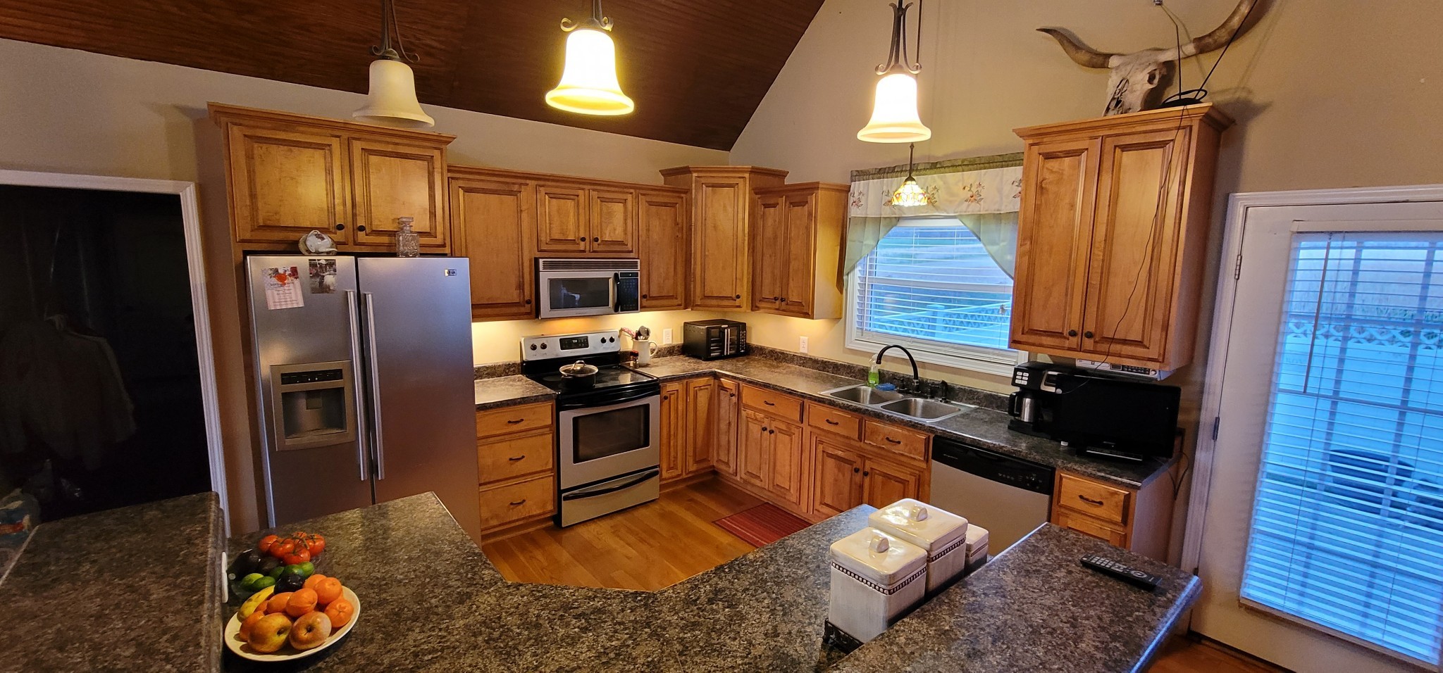 6197 H B Lee Road Springfield, TN 37172 - Photo 24 of 60 a kitchen with stainless steel appliances granite countertop a refrigerator stove and sink