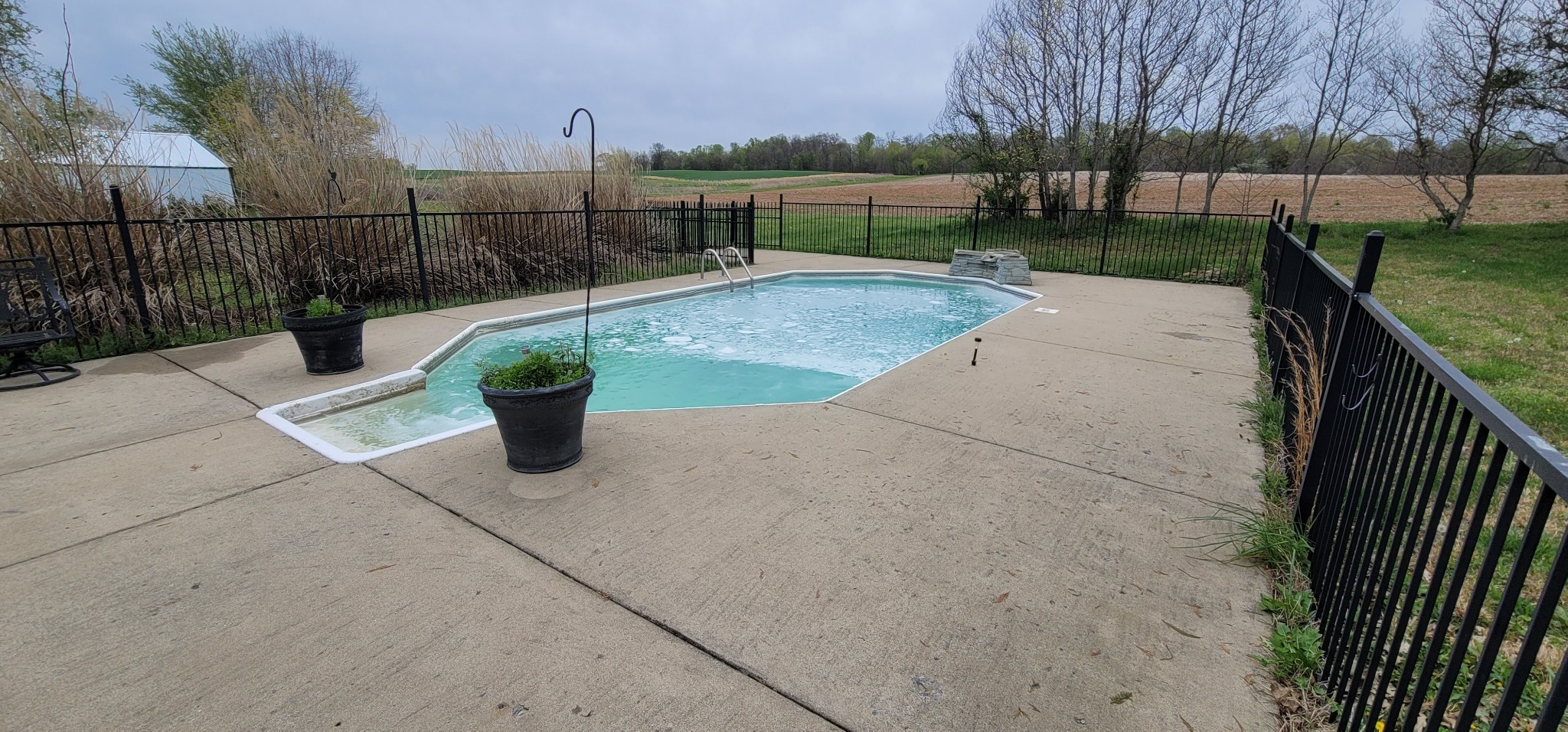 6197 H B Lee Road Springfield, TN 37172 - Photo 44 of 60 a view of a patio with a table and chairs