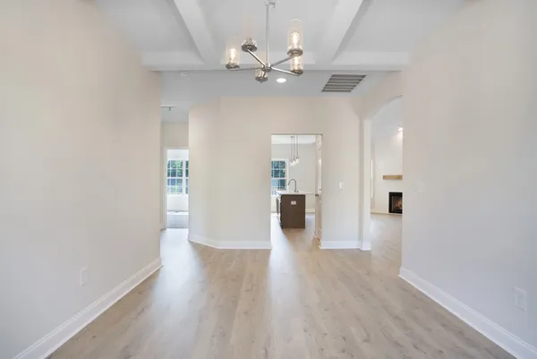 a view of a livingroom with a hardwood floor
