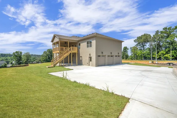 a front view of a house with a yard