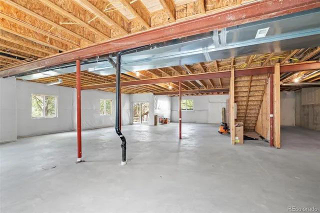 a view of a room with wooden walls