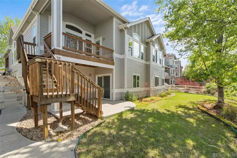 a view of a building with a yard