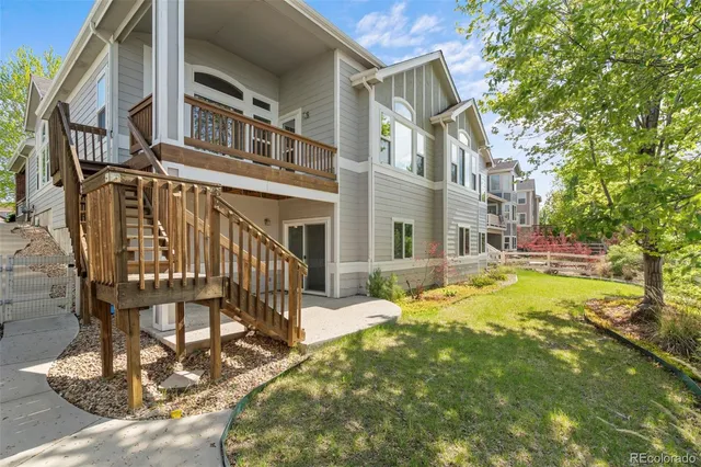 a view of a building with a yard