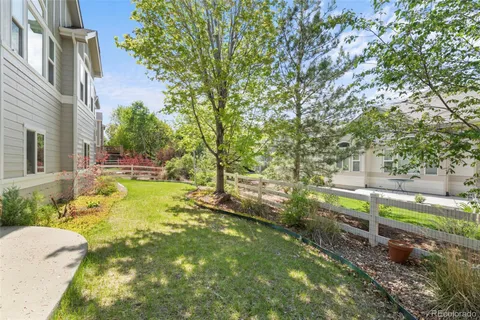 a view of yard with swimming pool