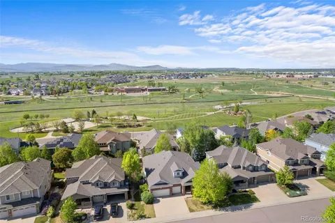 a view of lake and houses with outdoor space