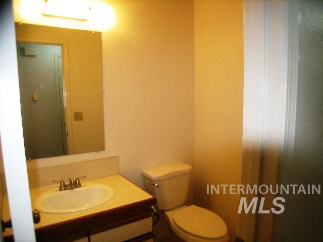 1484 East Carter Lane Boise, ID 83706 - Photo 3 of 9 Bathroom with toilet and vanity