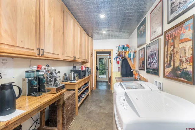 a bed room with a bed and a flat screen tv