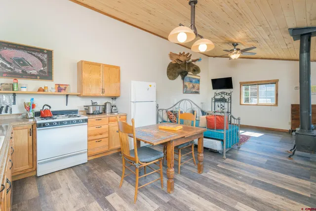 a bathroom with a sink a mirror and a shower