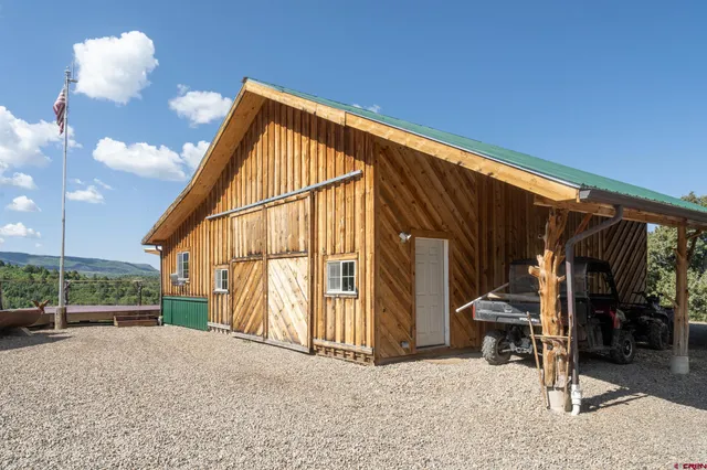 a view of house with outdoor space