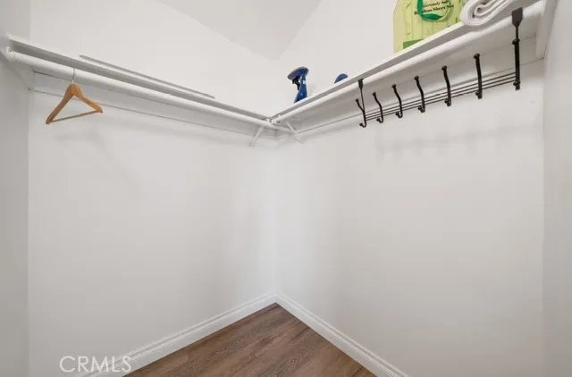 a view of a room with racks on the wall