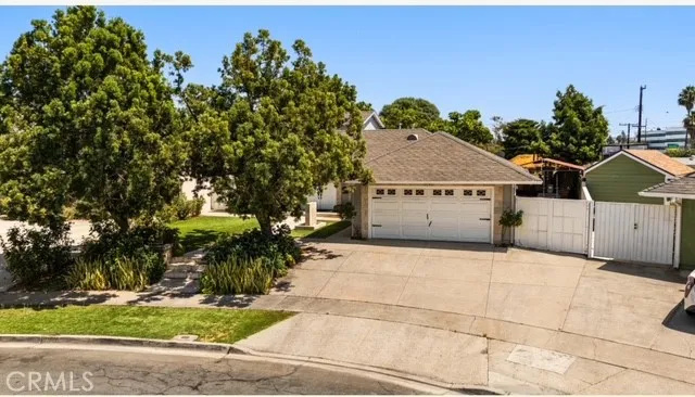 a view of a parking space with utility house