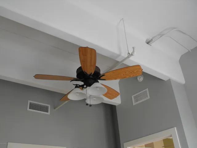 a view of a bathroom from a hallway