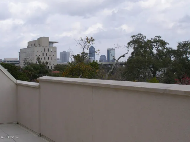 a terrace with a city view